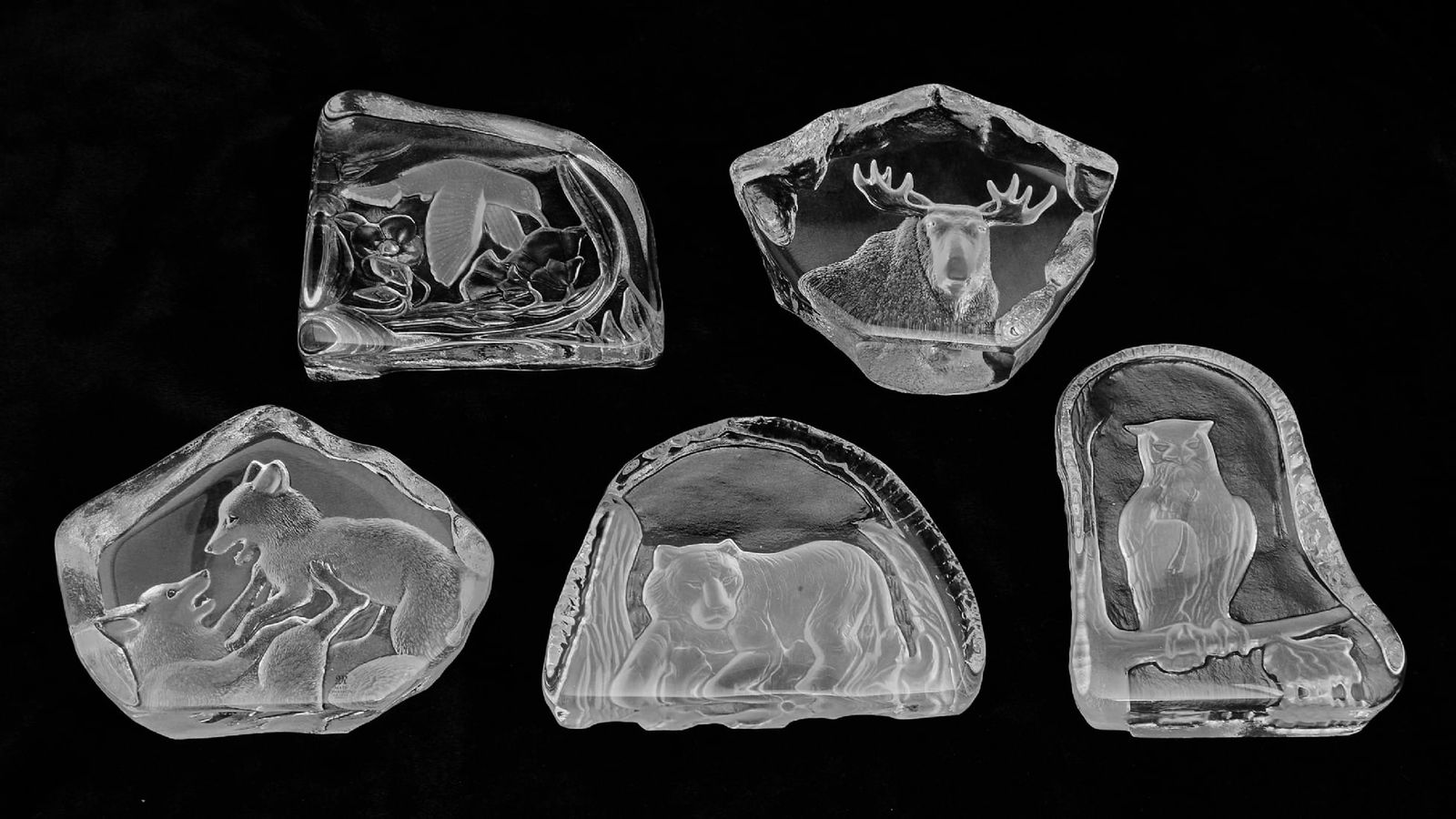 Five Artistic Glass Paperweights: Five Artistic Glass Paperweights, pair of crystal glass paperweights/bookends designed and engraved by Swedish designer Mats Jonasson, signed Additionally - 3 more glass paperweights - unsigned Height