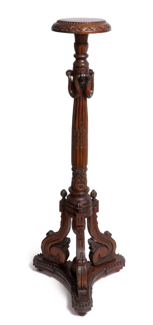 A tall and impressive display post, made of carved wood (1 of 7)