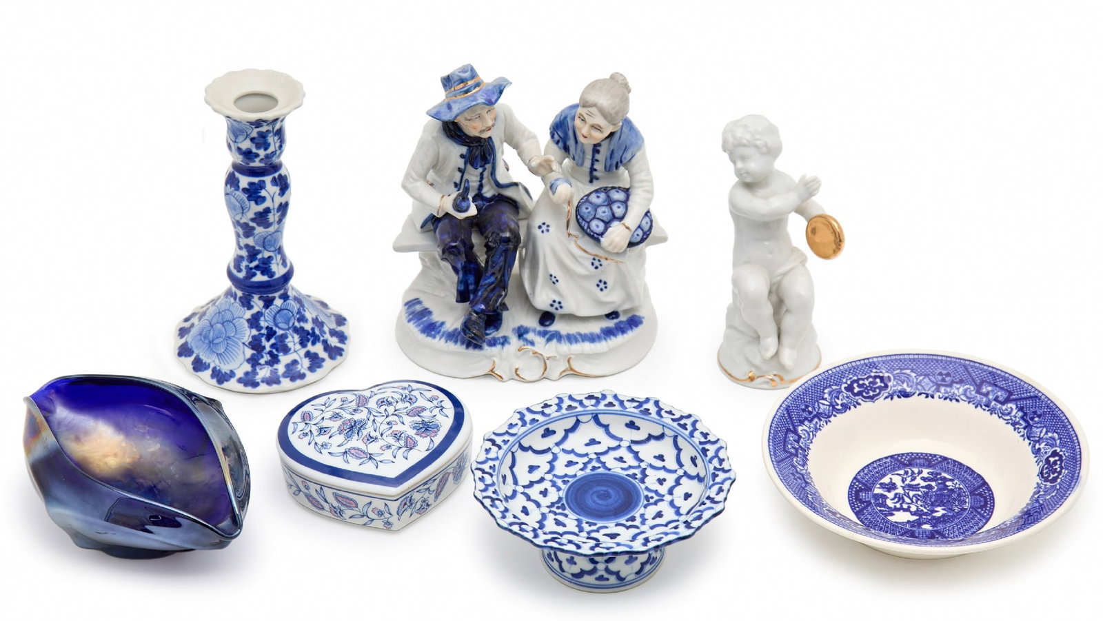 Seven Porcelain, Ceramic, and Glass Items Decorated in Blue and White: Seven Porcelain, Ceramic, and Glass Items Decorated in Blue and White, height of candlestick: 15 cmNotice: We are located in Israel and provide full packing and shipping service. You can ask us for a