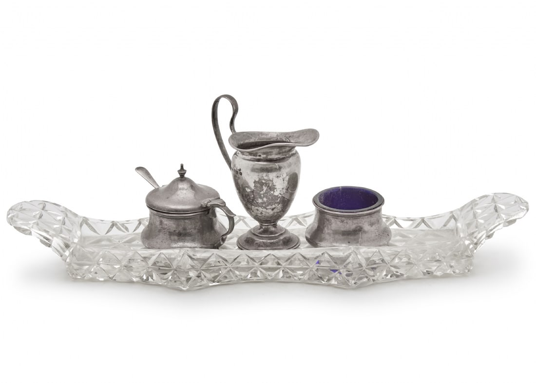 Sterling Silver Cruet Set with Cobalt Glass Containers, on a Crystal Tray: Sterling Silver Cruet Set with Cobalt Glass Containers, on a Crystal Tray, length of the set: 35 cm Height of the central silver piece: 10 cm Silver pieces are stamped Weight: 118 grams Notice: We are