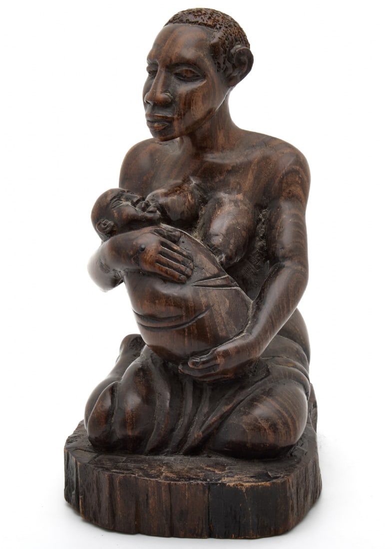African Ebony Wood Sculpture of a Mother Nursing Her Child: African Ebony Wood Sculpture of a Mother Nursing Her Child, hand-carved from hardwood with natural color Height: 21 cm Notice: We are located in Israel and provide full packing and shipping service. Y