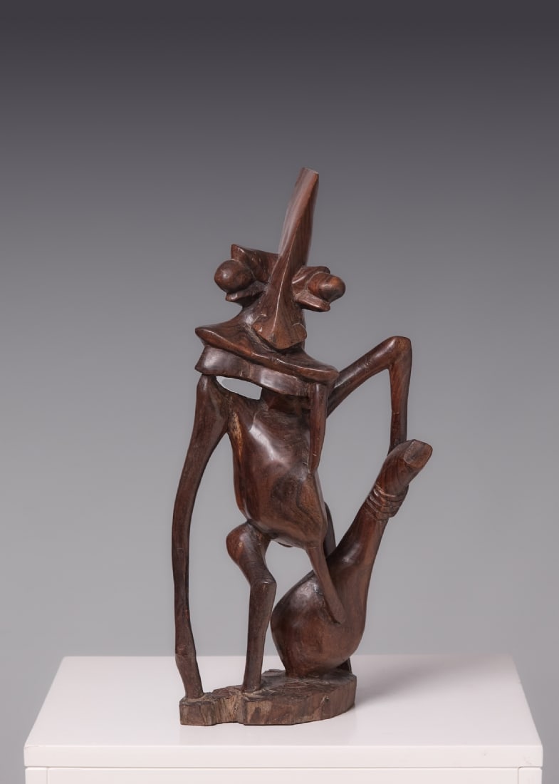 Hand-Carved Wooden Sculpture from Tanzania: Hand-Carved Wooden Sculpture from Tanzania, width: 20 cm Height: 44 cm Notice: We are located in Israel and provide full packing and shipping service. You can ask us for a shipping quote before the sa
