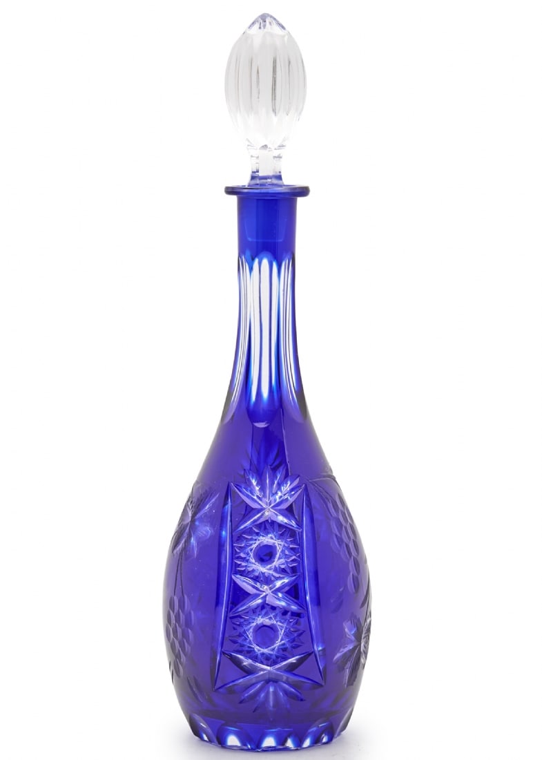 Cobalt Blue Crystal Decanter in Cut-to-Clear Style: Cobalt Blue Crystal Decanter in Cut-to-Clear Style, decorative cutting and polishing work with matching original crystal stopper. Total height: 39 cm Notice: We are located in Israel and provide full 