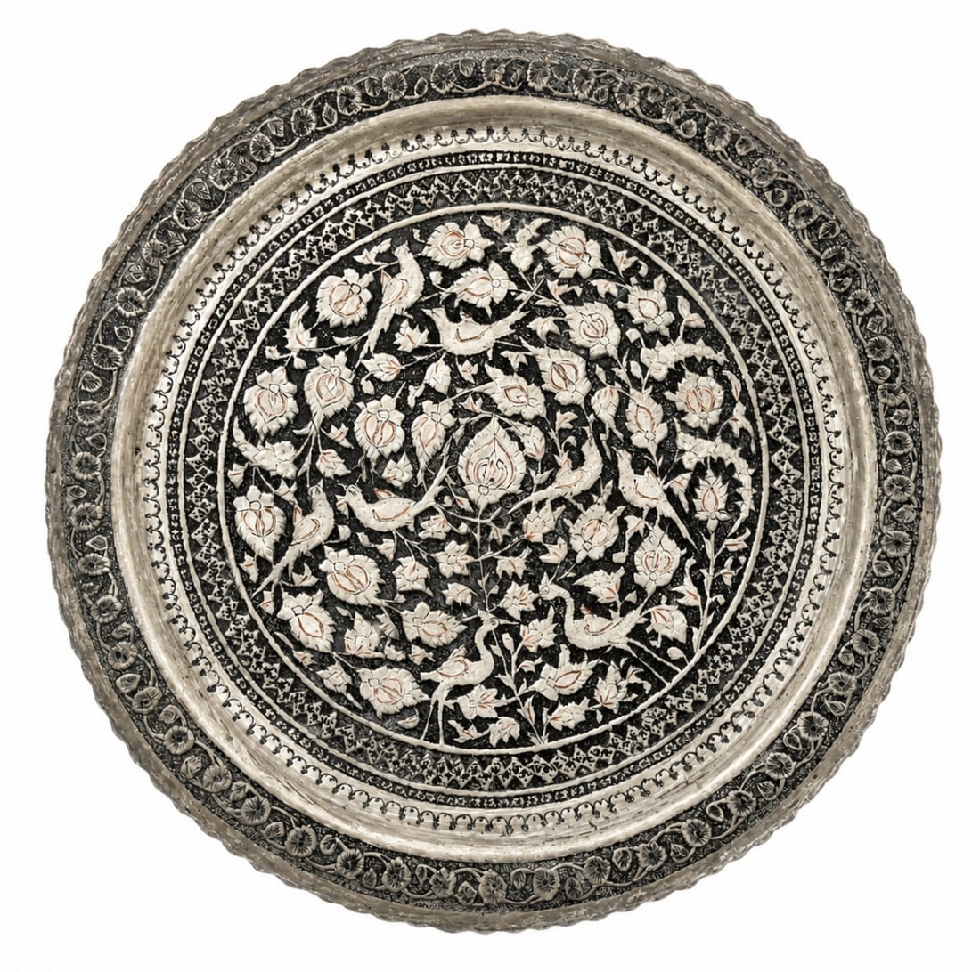 Large round Persian copper tray: Large round Persian copper tray, decorated with hand-hammered and engraved motifs, tin-plated. Fitted with a hanging loop on the back for wall display. Diameter: 59 cm Notice: We are located in Israel