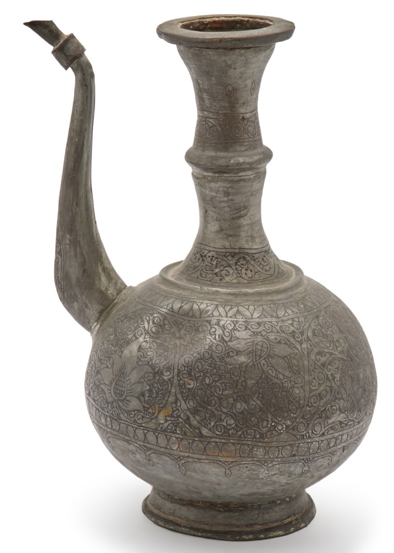 Islamic Aftaba, Made of Metal Decorated with Floral Patterns: Islamic Aftaba, Made of Metal Decorated with Floral Patterns, rounded body, tall neck, and arched handle Defects and dents, missing lid Height: 31 cm Width: 21 cm Notice: We are located in Israel and 
