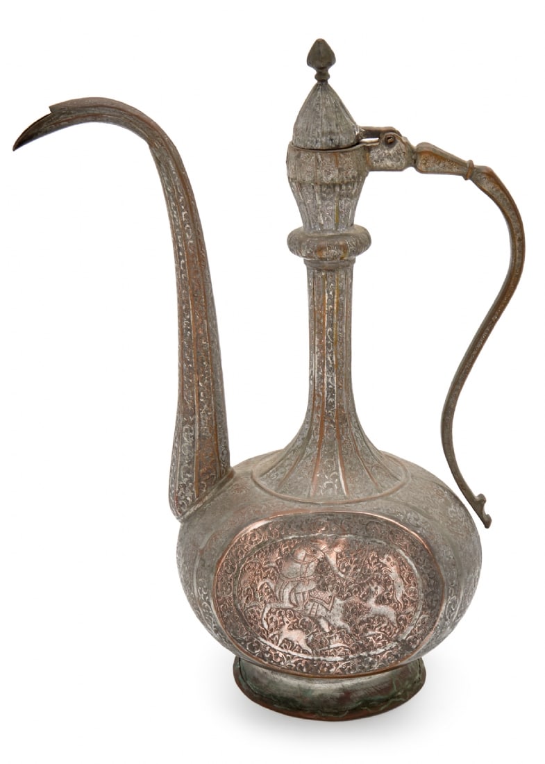 Antique Persian Islamic Ewer from the Qajar Period with Tin Coating Remnants: Antique Persian Islamic Ewer from the Qajar Period with Tin Coating Remnants, made of decorated copper Total width: 29 cm Total height: 39.5 cm Notice: We are located in Israel and provide full packin