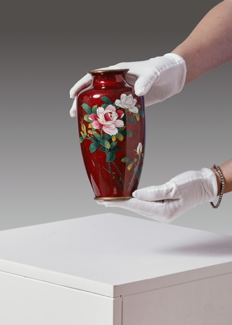Japanese Metal Vase Decorated with Cloisonne Enamel on Ginbari Background: Japanese Metal Vase Decorated with Cloisonne Enamel on Ginbari Background, signed Sato Japan, with a small, fairly hidden flaw under the upper rim and another flaw above the white flower (photographed