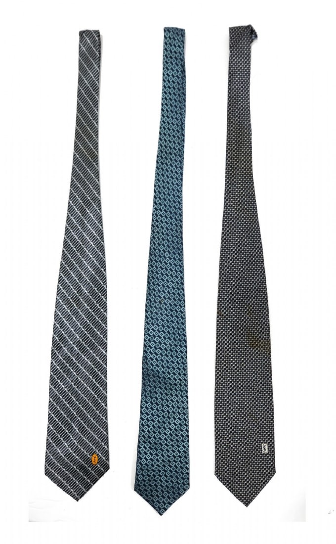Three Ties by Yves Saint Laurent: Three Ties by Yves Saint Laurent, three high-quality designer ties by Yves Saint Laurent. Some are new. Some have stains Notice: We are located in Israel and provide full packing and shipping service.