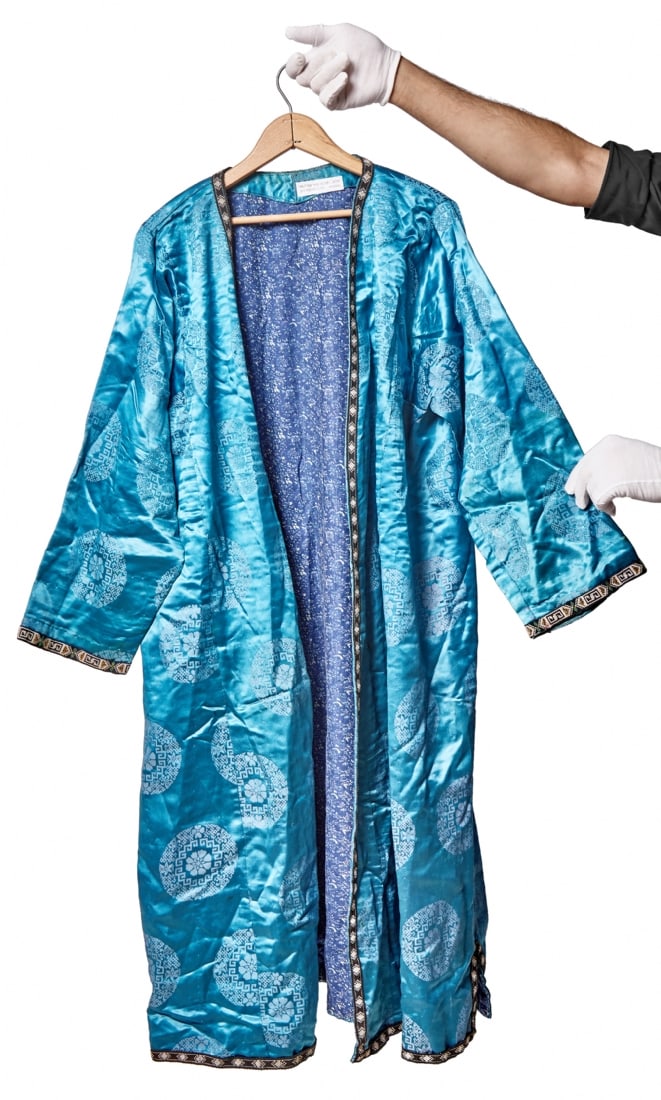 Turkmen Silk Robe/Caftan Made of Turquoise Silk Fabric with Pattern: Turkmen Silk Robe/Caftan Made of Turquoise Silk Fabric with Pattern, open front with dark decorative ribbon trim along the edges Length: 120 cm Notice: We are located in Israel and provide full packin