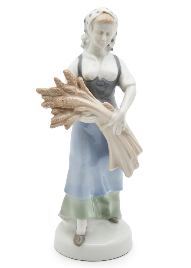 German Porcelain Figurine of a Peasant Woman Harvesting, Decorated with Hand Painting and Signed: German Porcelain Figurine of a Peasant Woman Harvesting, Decorated with Hand Painting and Signed, height: 25 cm Width: 11 cm Notice: We are located in Israel and provide full packing and shipping serv