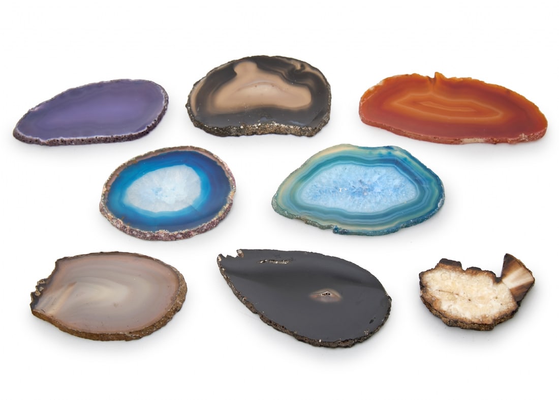 Set of Seven Polished Agate Stone Slices: Set of Seven Polished Agate Stone Slices, in stunning shades of blue, turquoise, purple, brown, and black. Length: 6-7 cm Notice: We are located in Israel and provide full packing and shipping