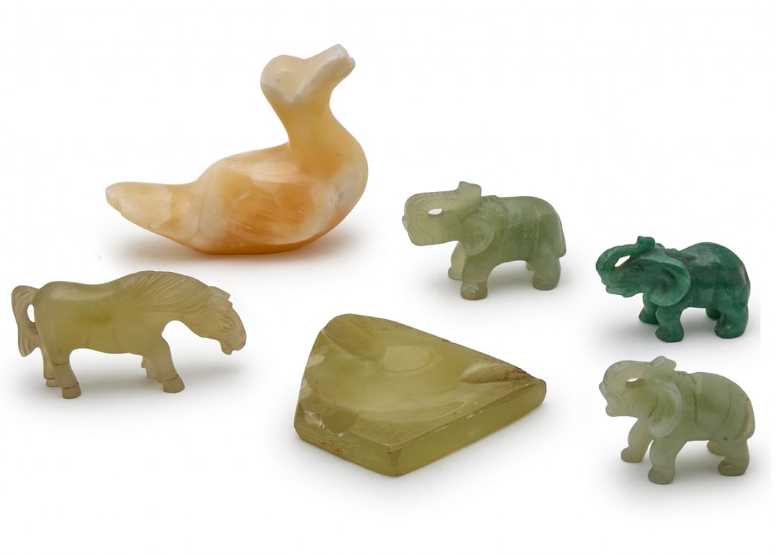 Six Small Carved Stone Figurines: Six Small Carved Stone Figurines, includes animal figures, a bird, an ashtray, and additional decorative items Dimensions: 5-9 cm Notice: We are located in Israel and provide full packing and shipping