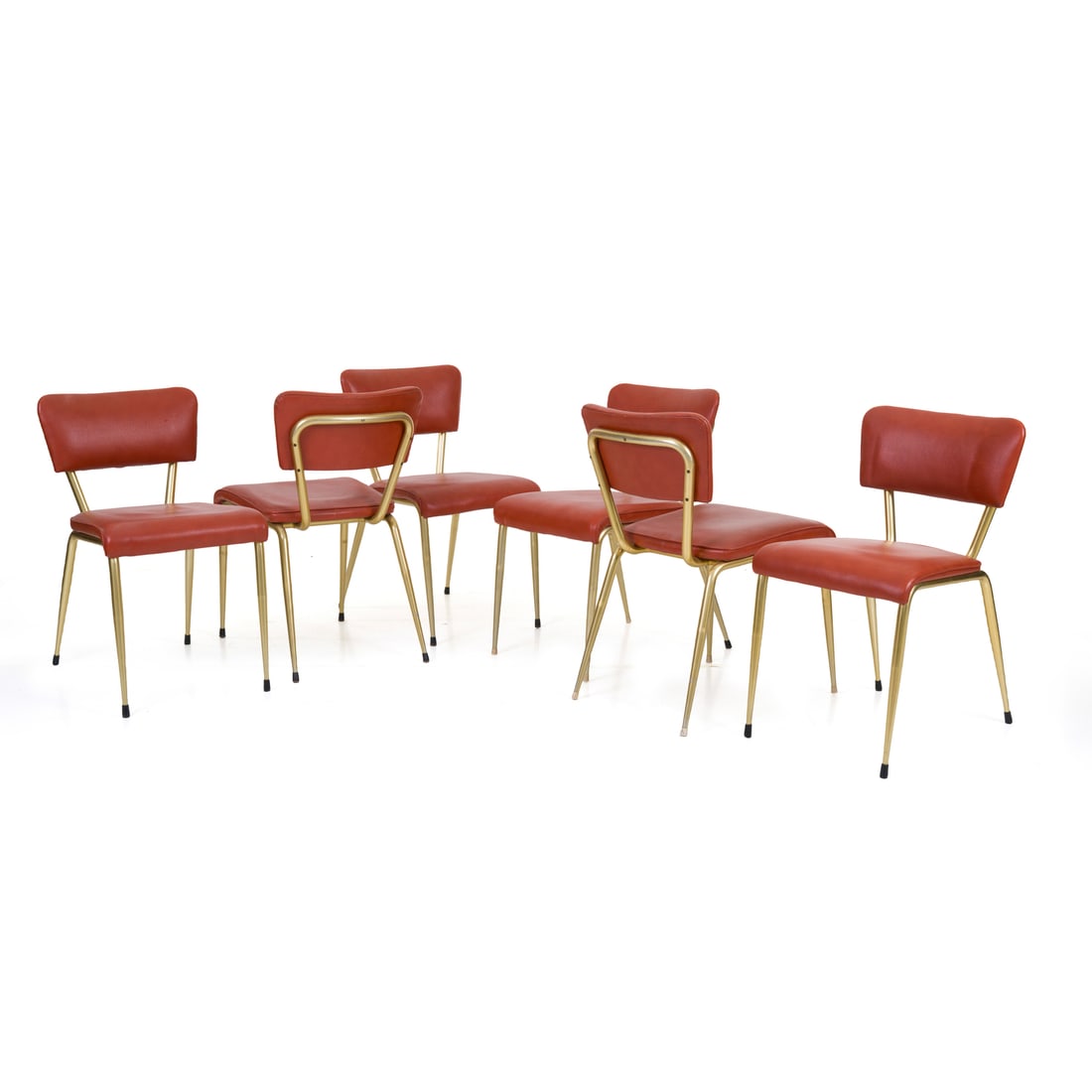Manifattura italiana, 1960 ca.: Manifattura italiana Sei sedie Struttura in metallo dorato, rivestimenti in skai rosso Prod. Italia, 1960 ca. 75 x 45 x 55 cm Italian manufacture Set of six chairs Gilt metal structure, red skai uphol
