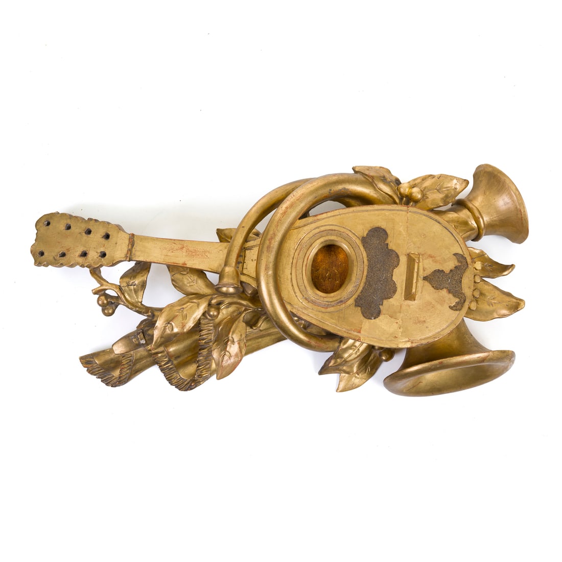Elemento decorativo, Italia, XIX secolo: Elemento decorativo raffigurante strumenti musicali Legno intagliato e dorato Italia, XIX secolo 51 x 27 cm A decorative element depicting musical instruments Carved and gilded wood Italy, 19th centur