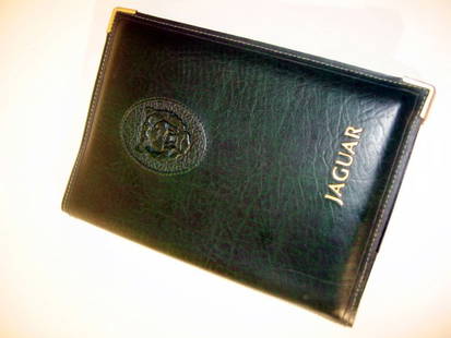 Jaguar XJ6 Document Wallet: Factory issued green leather document wallet with embossed Jaguar insignia. Contains the handbook and other related paperwork for the 2.9 and 3.6 litre XJ6 variants. Produced 1990 and good condition.