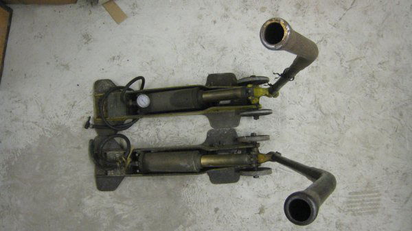 Garage Equipment: Includes two Dunlop trolley compressors, with correct manufacturers plaques & in good original condition, together with a large heavy-duty lifting jack, a box containg a selection of smaller jacks and