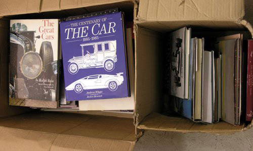 Assorted Motoring Books: Two large boxes, containing a quantity of general motoring pictorial books, plus a smaller selection of marque specific titles. Approximately 30 titles in all. Primarily very good condition, with