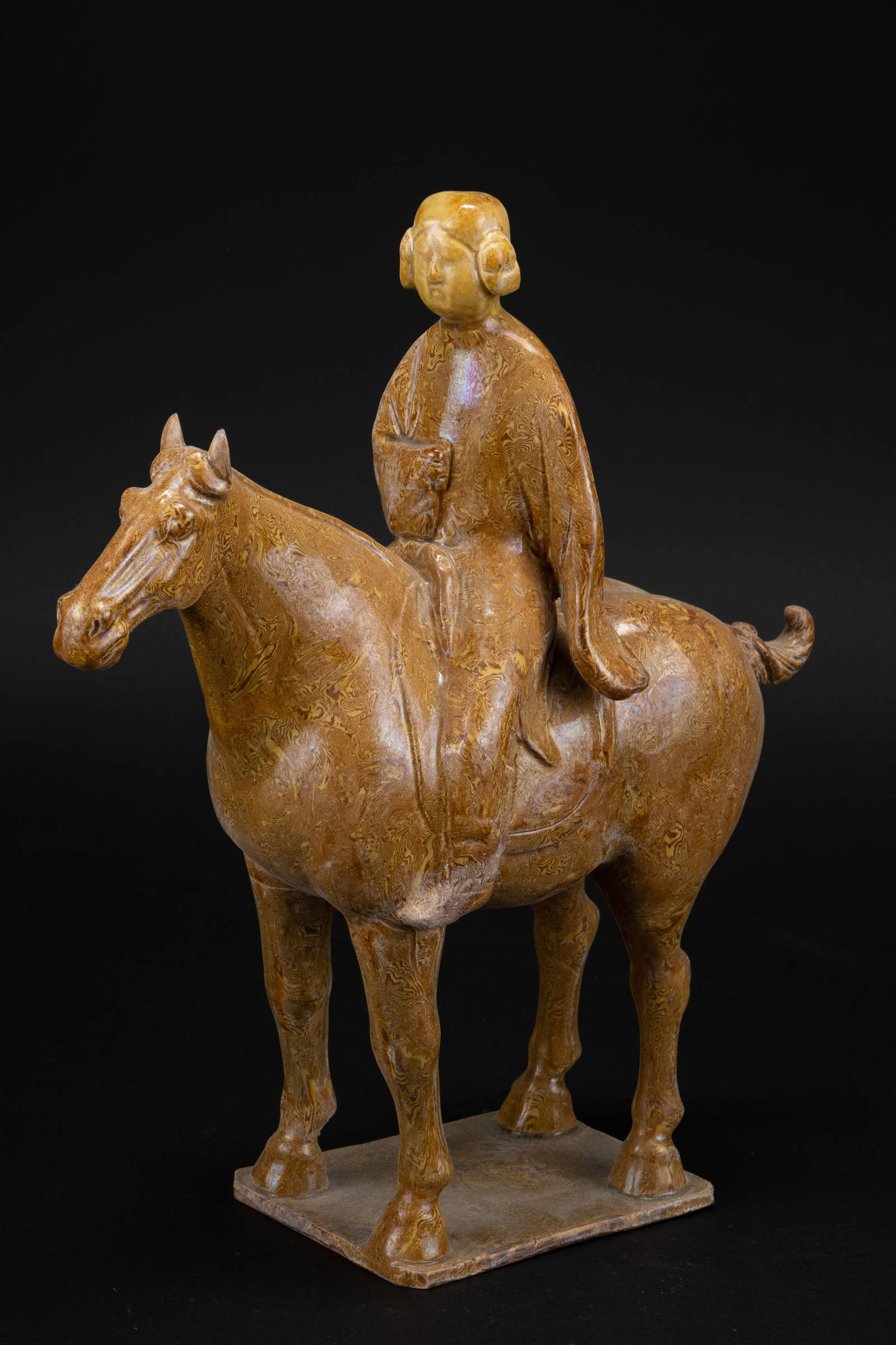 Tang Dynasty Three Colored Yellow Glazed Man Riding Horse Auction