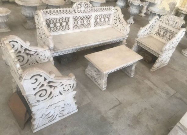Carved marble patio furniture set of two arm chairs a three seater sofa. (1 of 4)