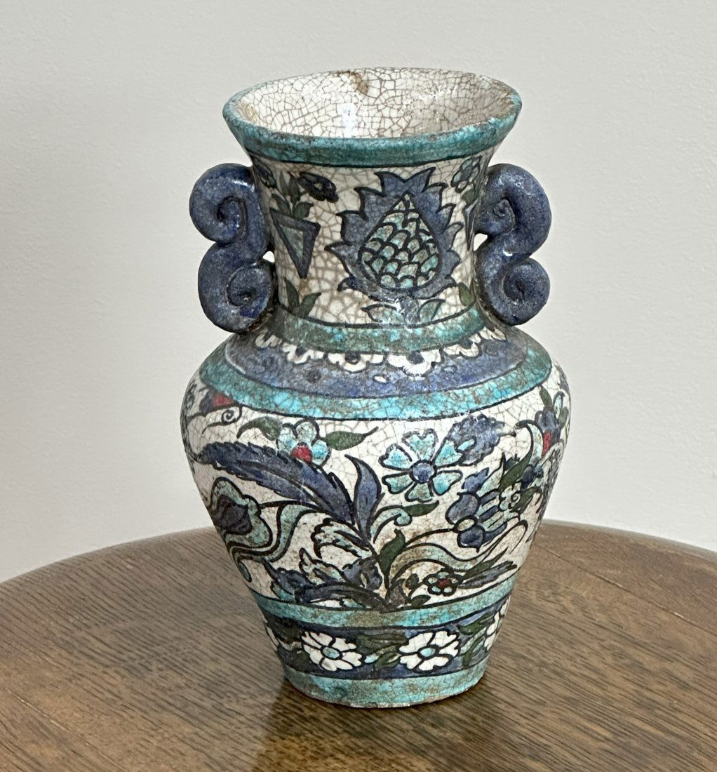 Pottery vase decorated with floral motifs (1 of 3)