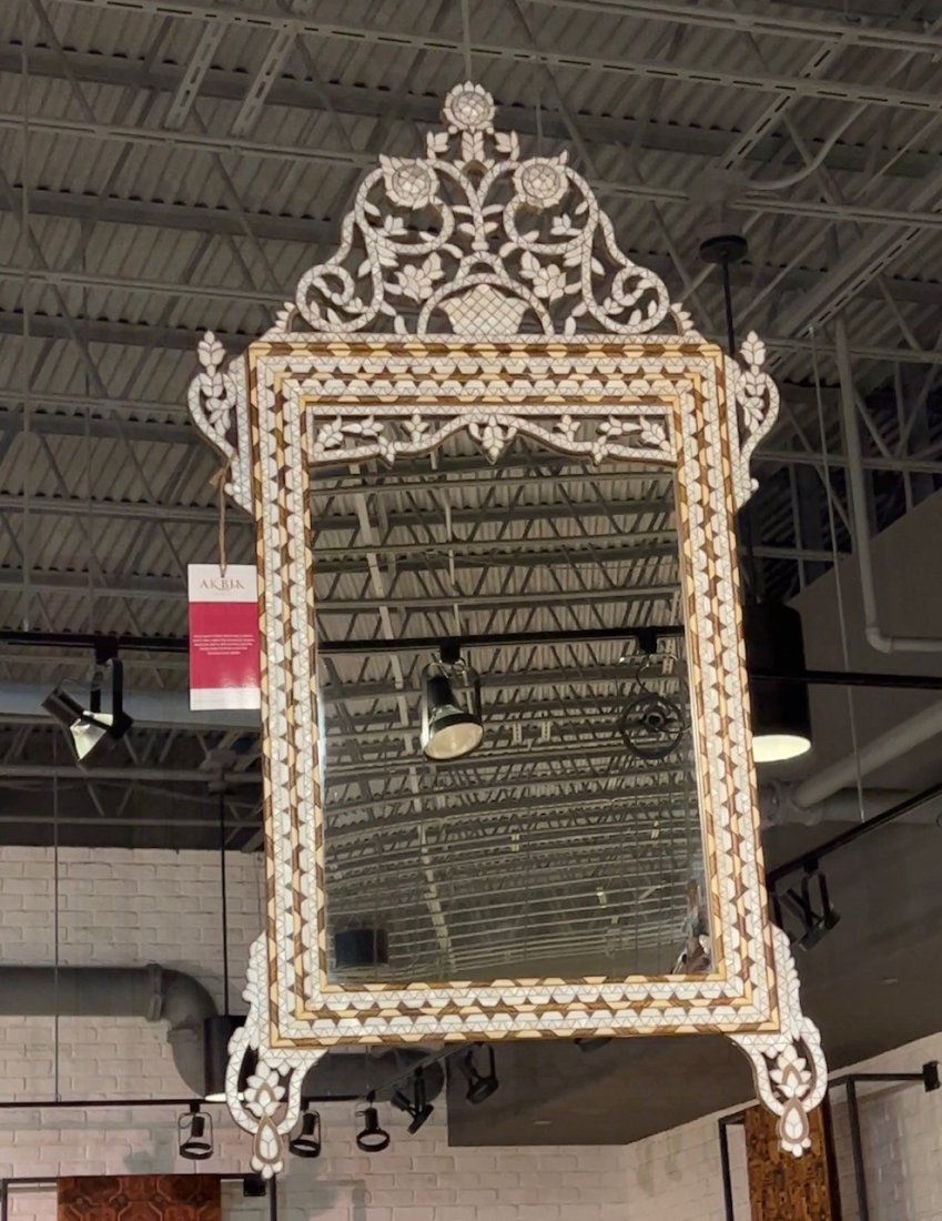 Mother of Pearl Syrian Mirror: "Featuring a pierced crown and exquisite mother of pearl inlay, this piece is in excellent condition with no missing inlays or broken parts. Its approximate dimensions are 34 inches long, 1 inch deep,