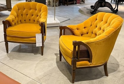A pair of midcentury wooden club chairs with original golden yellow vibrant velvet upholstery