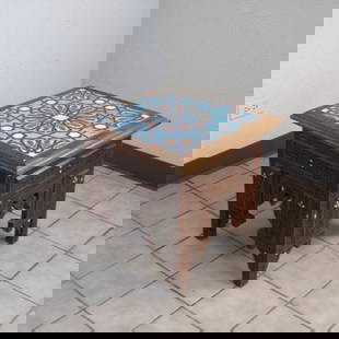 Syrian carved walnut side table with iznik ceramic top: Square side table with iznik ceramic tile top. One of the tiles is cracked close to the corner but it is in place and not moving. The condition is good overall with nice carving and inlay on the sides