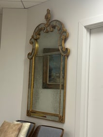 Antiqued mirror on a golden gilded frame made in NY