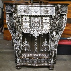 Syrian vintage console table inlaid with mother of pearl on walnut .