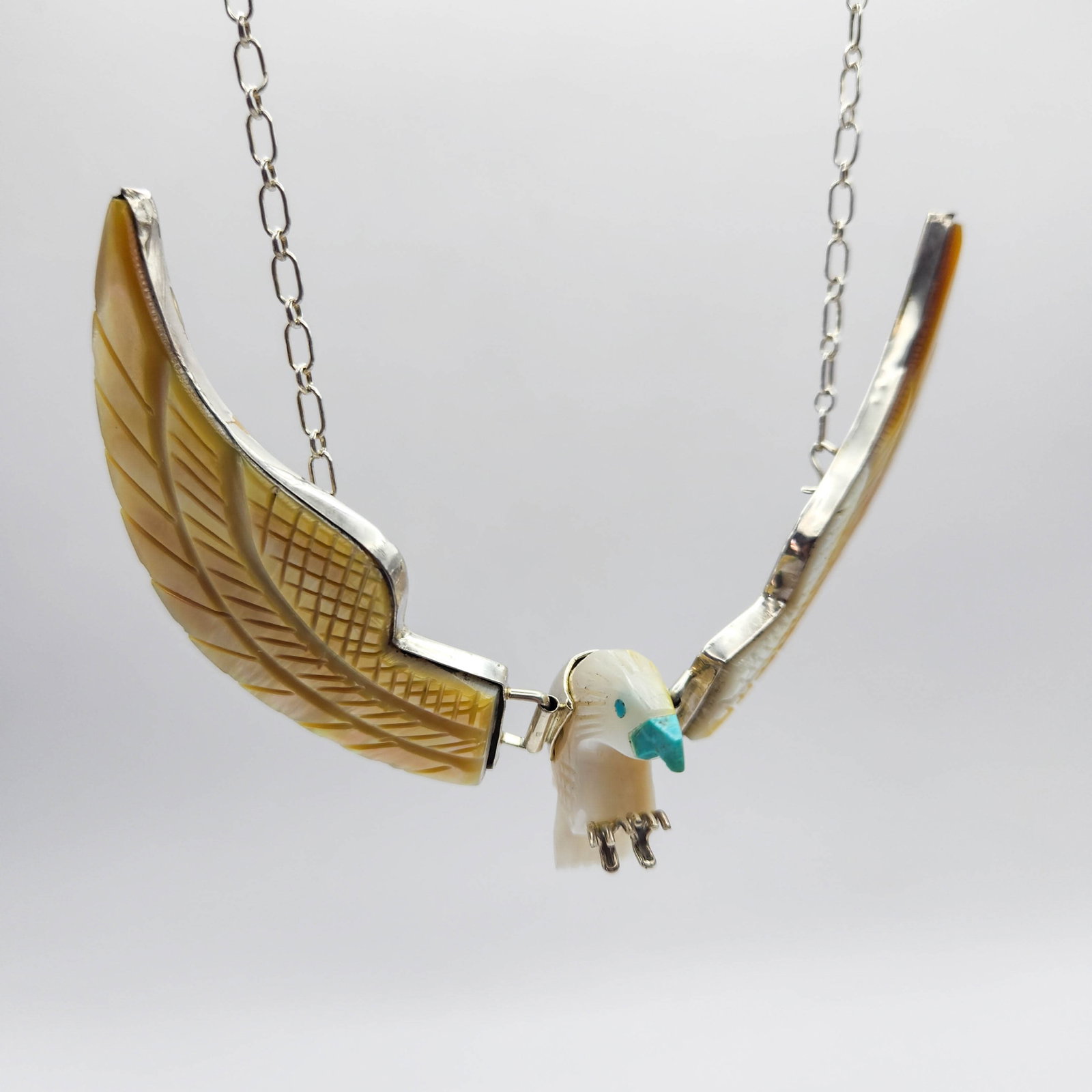 Navajo AB Sterling Mother of Pearl Turquoise Eagle 48g: This is a DIFFERENT piece. Sterling, Mother of Pearl, Turquoise, movable eagle. Amazing piece. Insane.