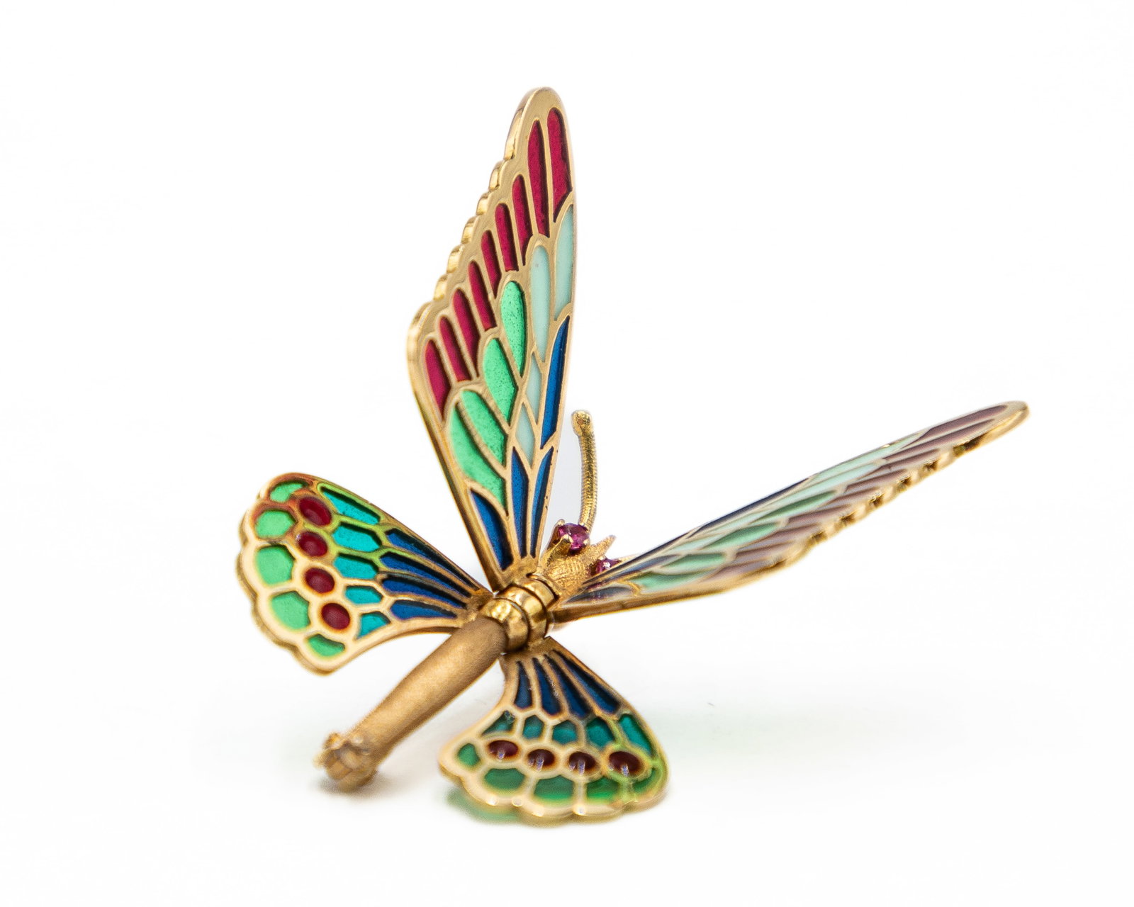 18k Mid Century Plique-a-Jour Butterfly Brooch: 18k Mid Century Plique-a-Jour Butterfly BroochA technique not commonly seen in mid century jewelry. Plique-a-jour, meaning 'letting in the daylight.' The wings of this rare species are colored with th