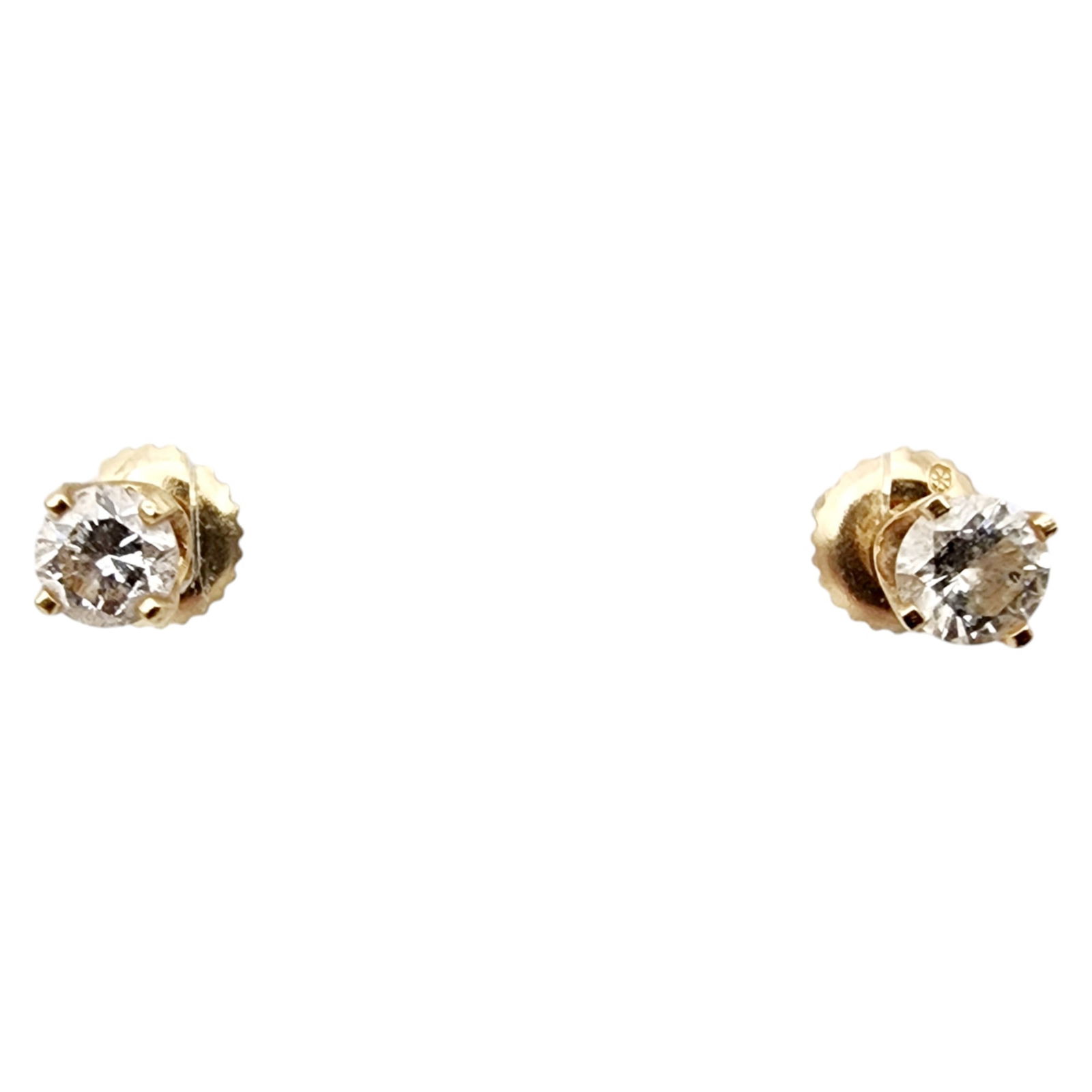 14k Gold Diamond Stud Earrings: 14k Gold Diamond Stud Earrings 1g w/ backs, tested with diamond tester, please note diamond tester accuracy decreases with size of stone. Unable to verify if diamond tester reading is correct.