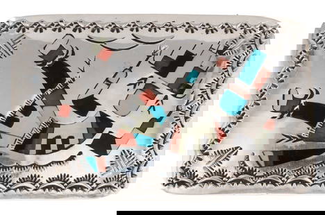 Benjamin Becenti Navajo Sterling Rainbow Man Inlay Belt Buckle: Benjamin Becenti Navajo Sterling Rainbow Man Inlay Belt Buckle | Materials: Sterling, Coral, Turquoise, Mother of Pearl, Onyx/Jet | Measurements: approximately 3 by 1 7/8 inches | Weight: 34.2g