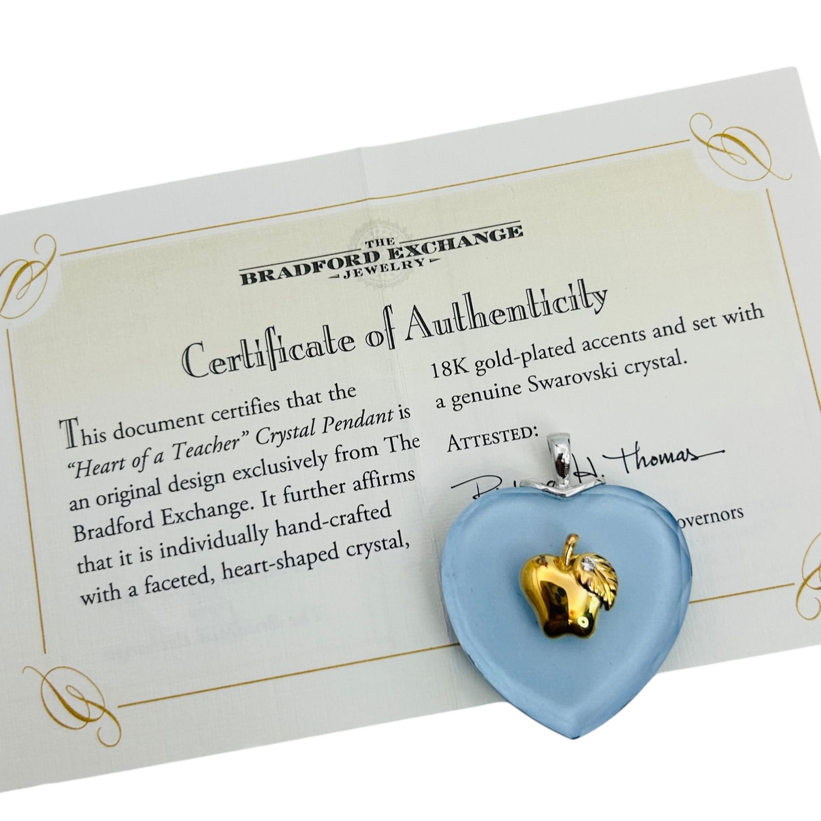 Authenticated Bradford Exchange Heart Of A Teacher Pendant Sterling In 18 K Gold Plated SWAROVSKI: Authenticated Bradford exchange heart of a teacher pendant Sterling in 18 K gold plated SWAROVSKI Crystal 9.19 g includes box