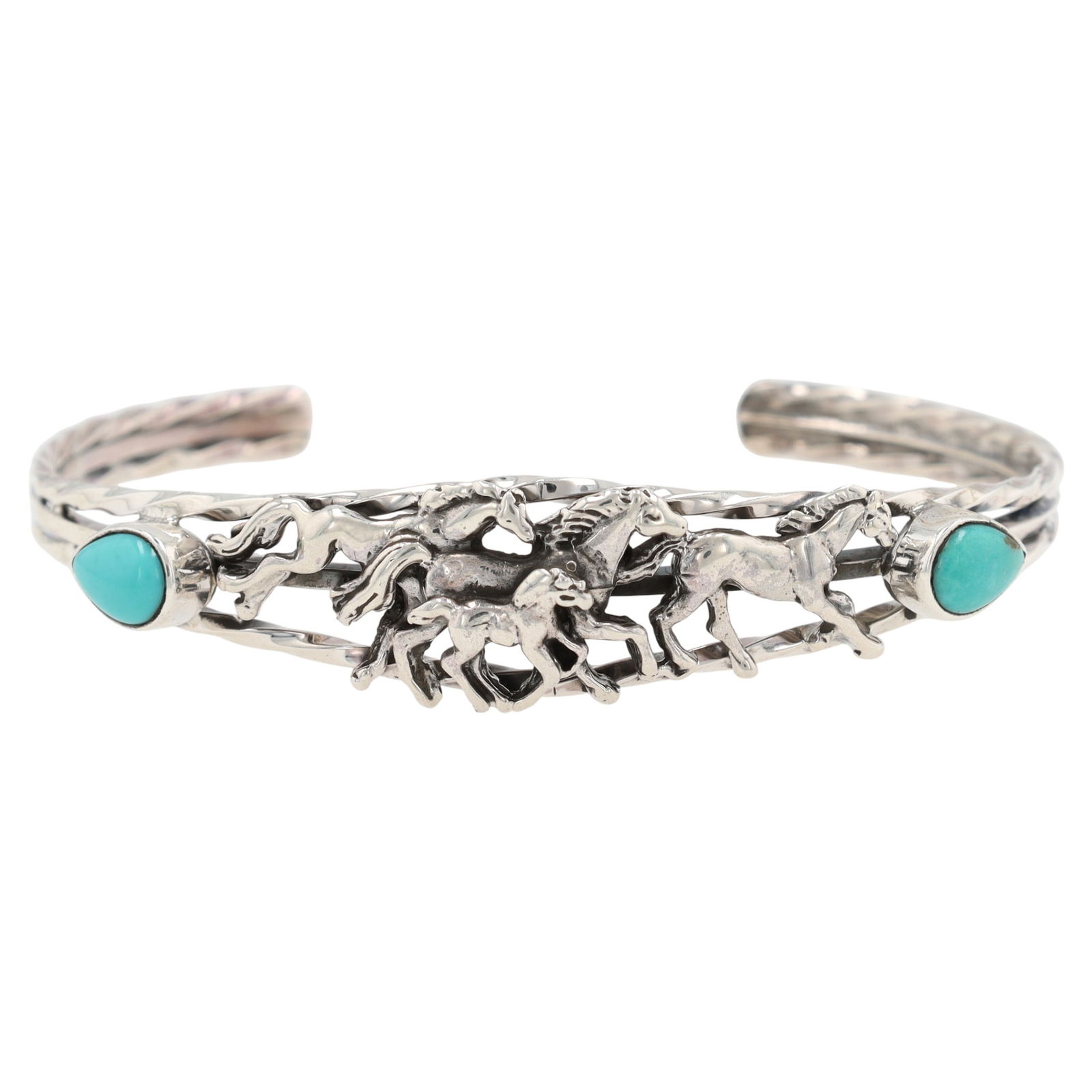 Bobby Platero Navajo Sterling Silver and Kingman Turquoise Horse Cuff Bracelet: A Navajo sterling silver cuff bracelet by Bobby Platero, featuring Kingman turquoise. This open cuff bracelet is primarily composed of silver, visibly marked "Sterling" on the interior band.