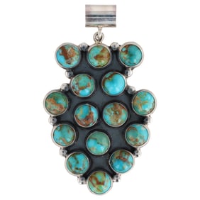A Navajo Martin Perry Sterling Silver Turquoise Cabochon Pendant