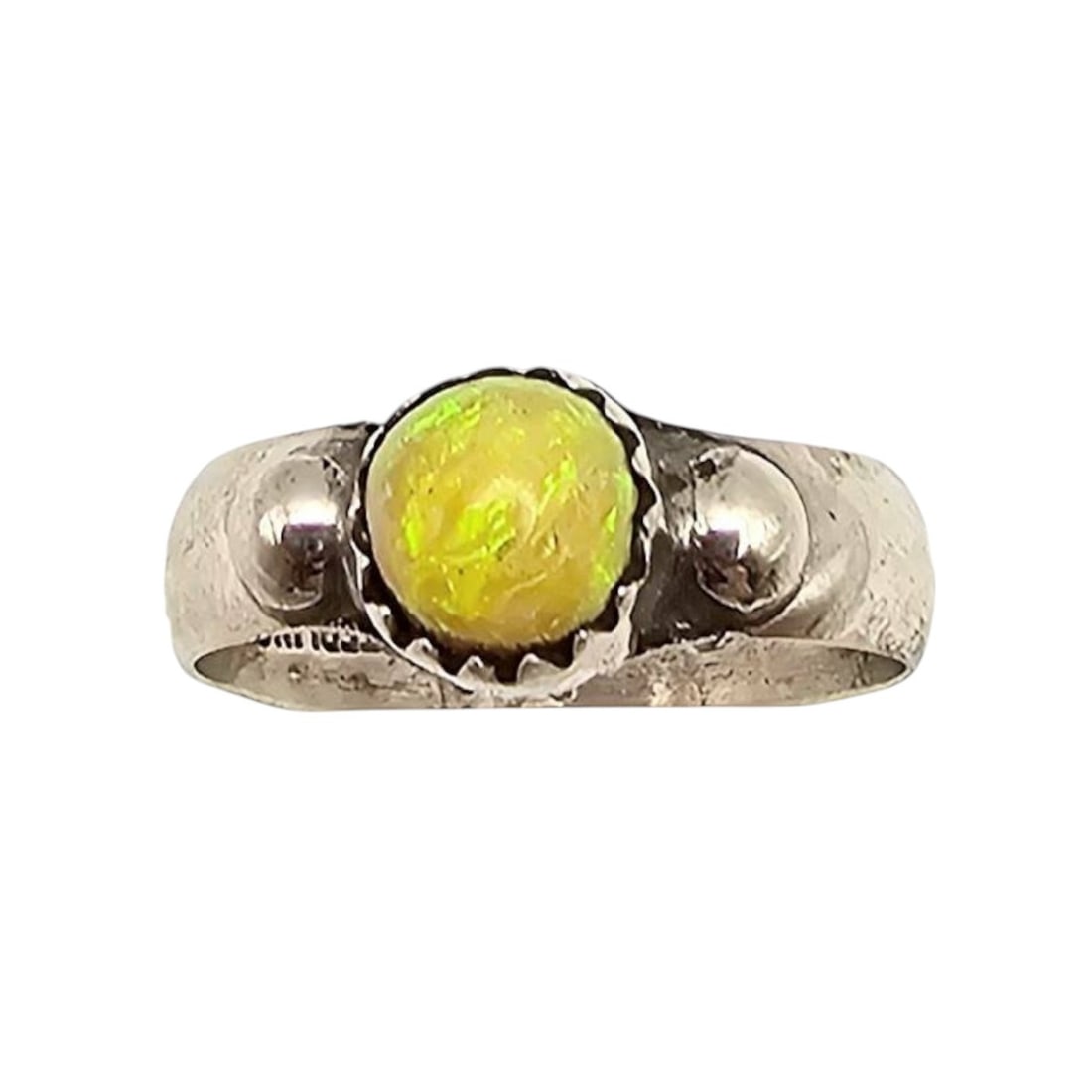 Jason Yazzie Navajo Sterling and Opal Ring, Size 6: A handmade sterling silver ring by Navajo artisan Jason Yazzie featuring a central opal cabochon with a fiery yellow hue. The ring is size 6 and weighs approximately 2.4 grams. It is "STERLING" and "J