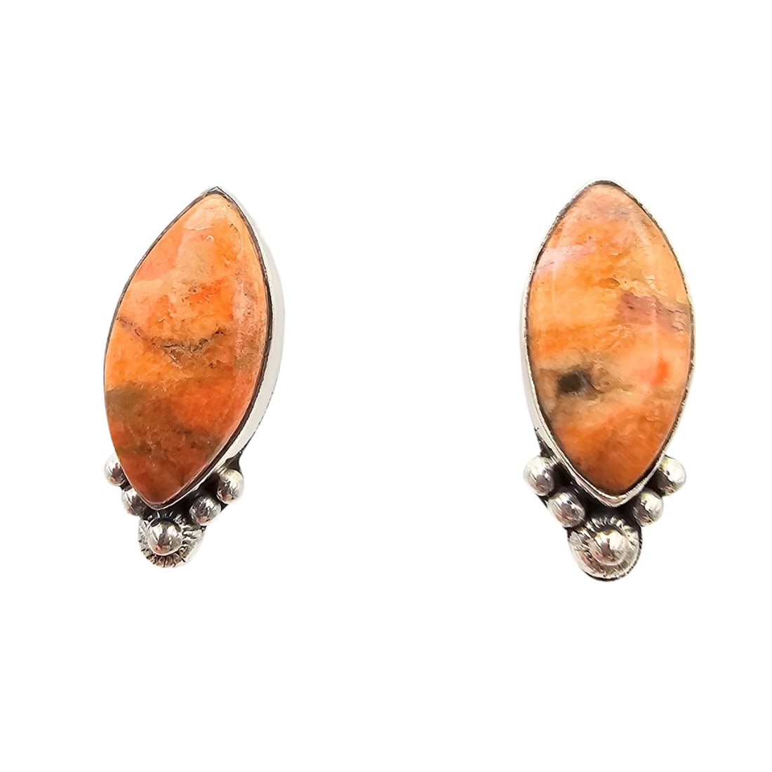 Hada Collection Sterling Apple Coral Earrings: Sterling silver earrings from the Hada Collection featuring apple coral stones in a marquise shape. Intricately accented with detailed silver beadwork along the bottom edge. 'sterling Hada' on the rev