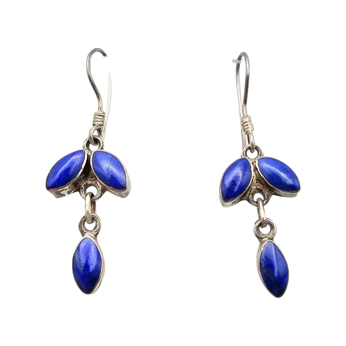 Lapis and Sterling Drop Earrings: Drop earrings crafted from sterling silver featuring lapis lazuli stones. Weighing approximately 4.4 grams, these earrings showcase an elegant dangling design with marquise-shaped lapis stones. Minor 