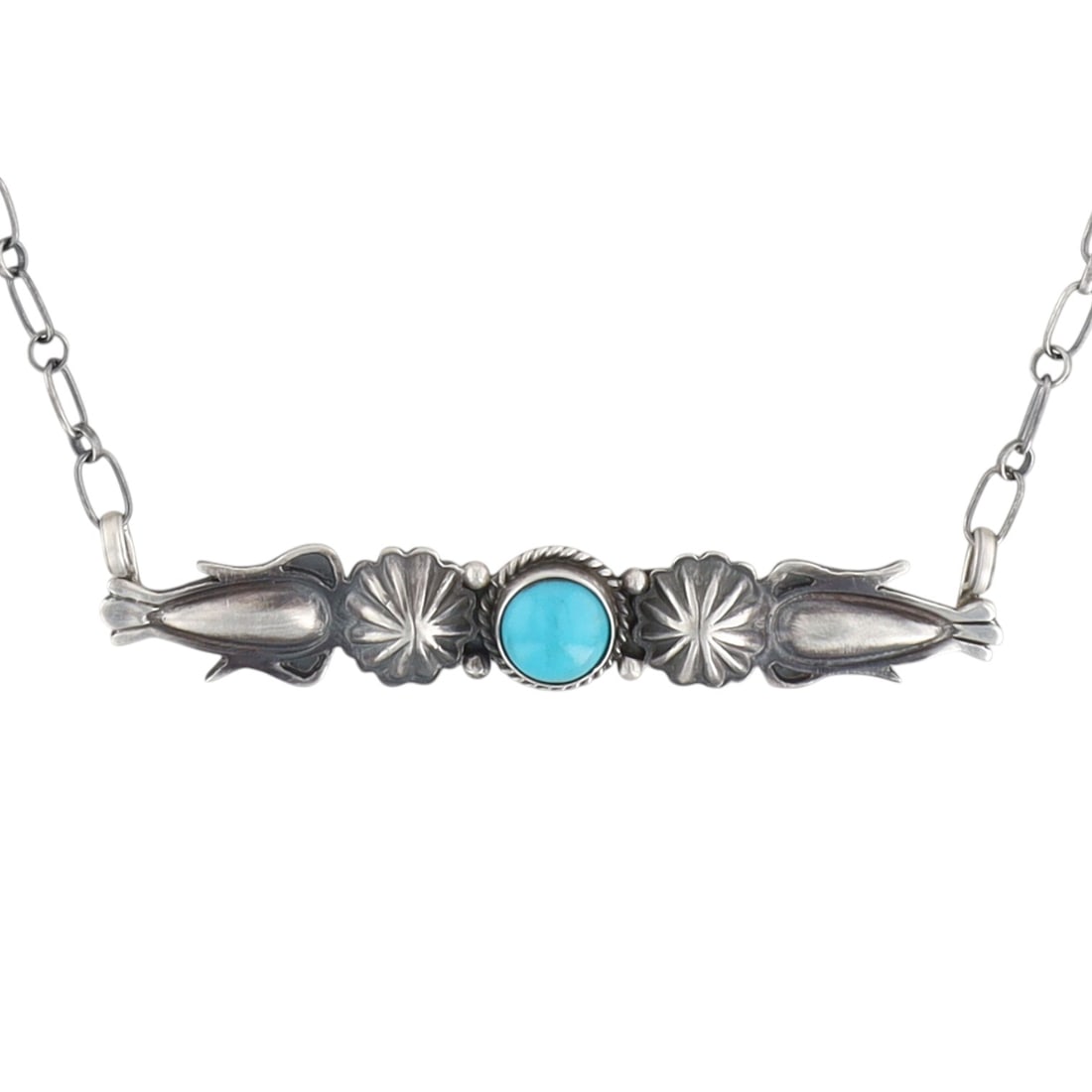 Marita Benally Navajo Sterling Silver Kingman Turquoise Necklace: A sterling silver Navajo handmade necklace by Marita Benally, featuring a central Kingman turquoise stone, decorative silver elements, a maker's mark for Running Bear Shop, and weighing 10g, measuring