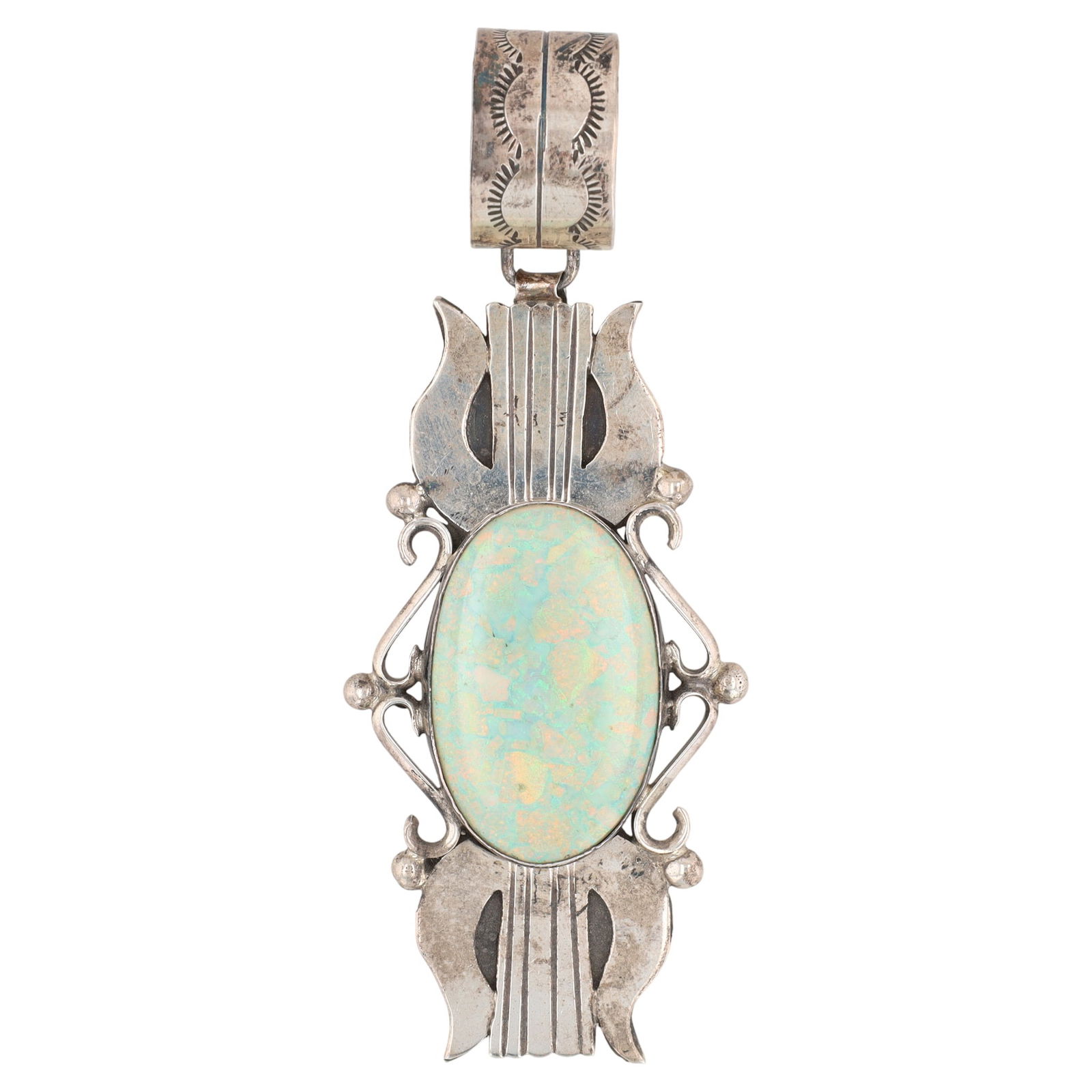 Betta Lee Navajo Sterling Opal Pendant: A Navajo silver and light green opal pendant by Betta Lee, stamped 'Sterling' and 'B. LEE', weighing 32g and measuring approximately 4.5 inches long.