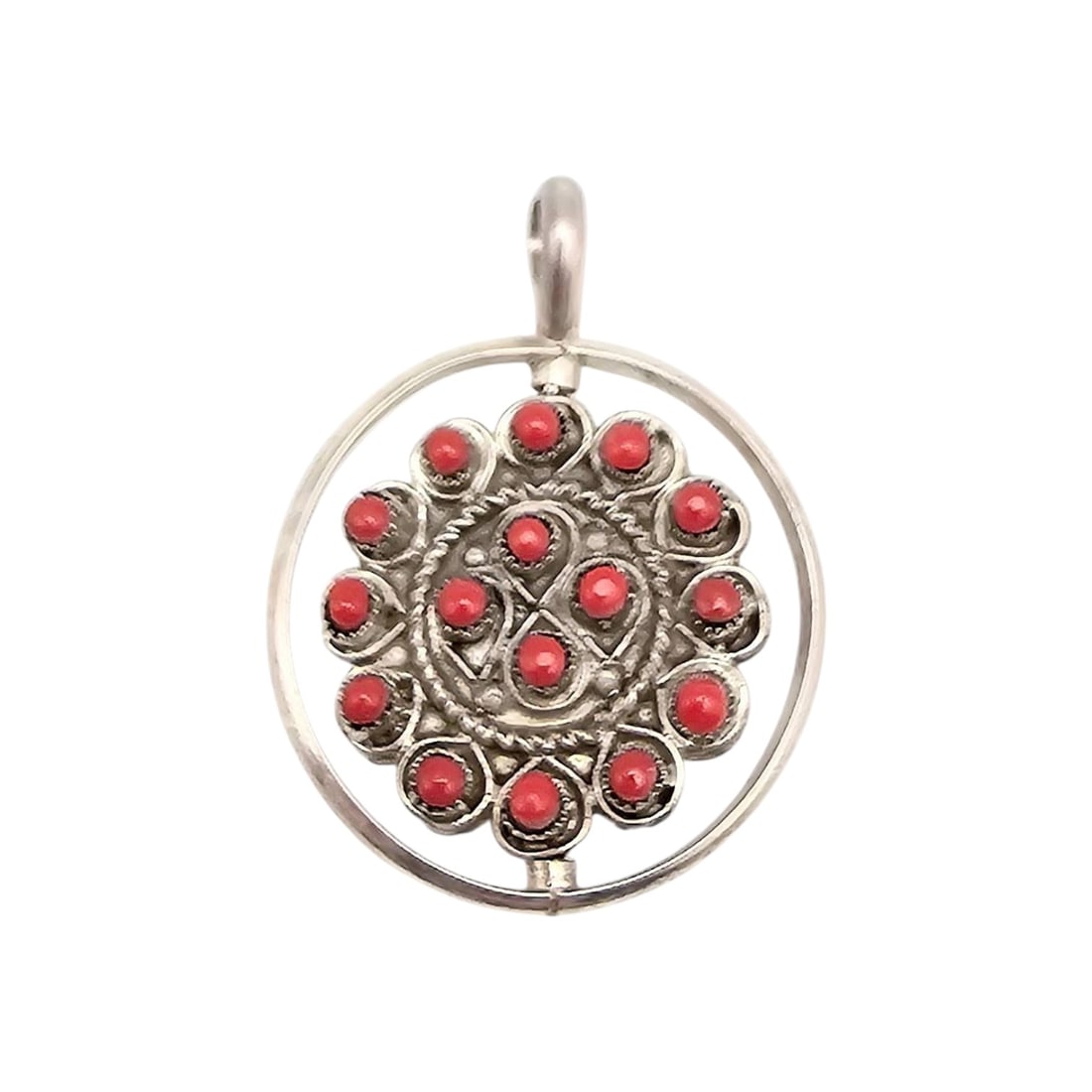 Waylon Johnson Zuni Sterling Turquoise & Coral Pendant: Handmade sterling silver pendant by Zuni artisan Waylon Johnson, featuring a reversible design with turquoise stones on one side and coral stones on the other. Weighs approximately 8.5 grams. Measures