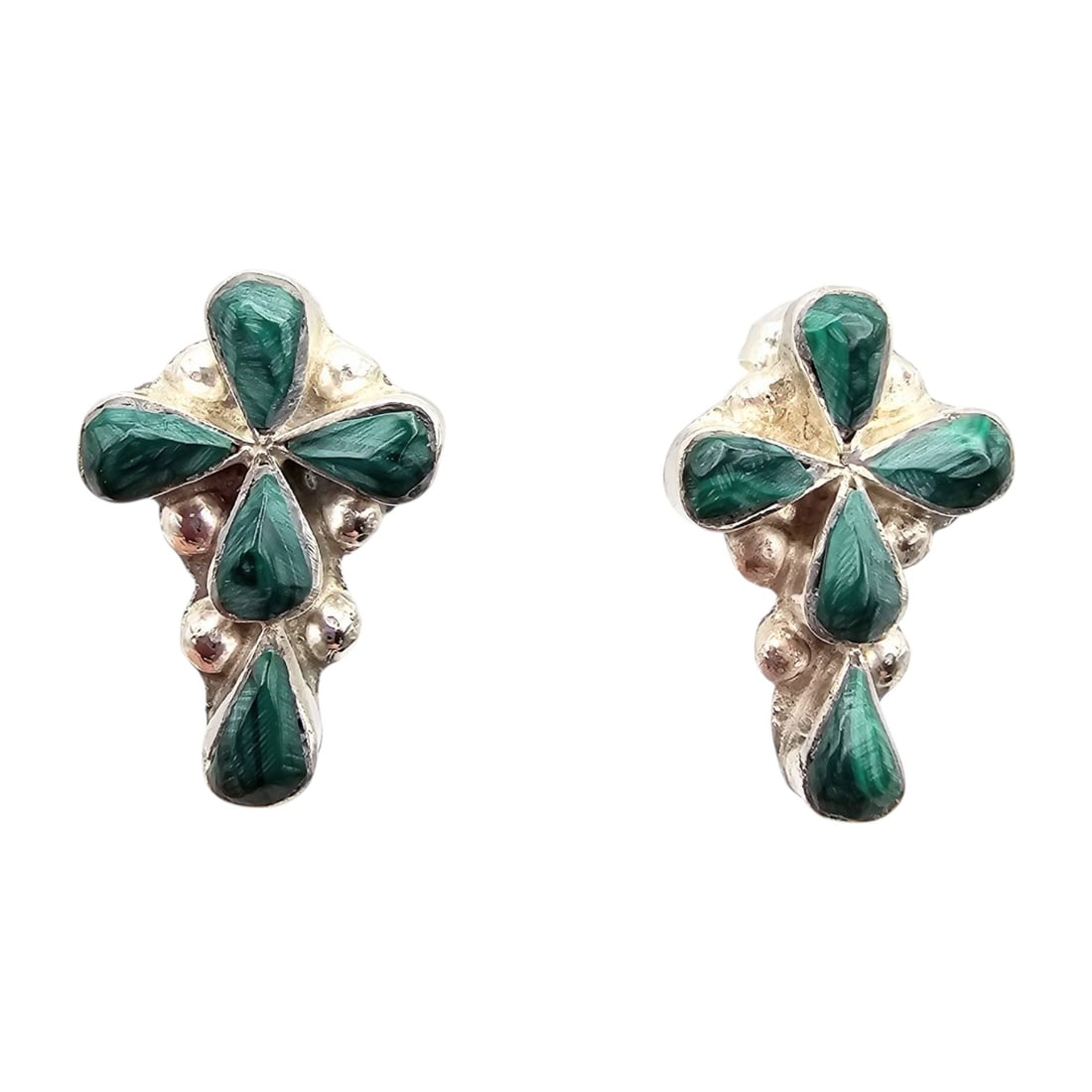 Pino Yunie Zuni Sterling Malachite Earrings: Handcrafted earrings by Zuni artisan Pino Yunie, featuring sterling silver and malachite inlay. The earrings exhibit a clover-like design with detailed silverwork. Each earring measures approximately