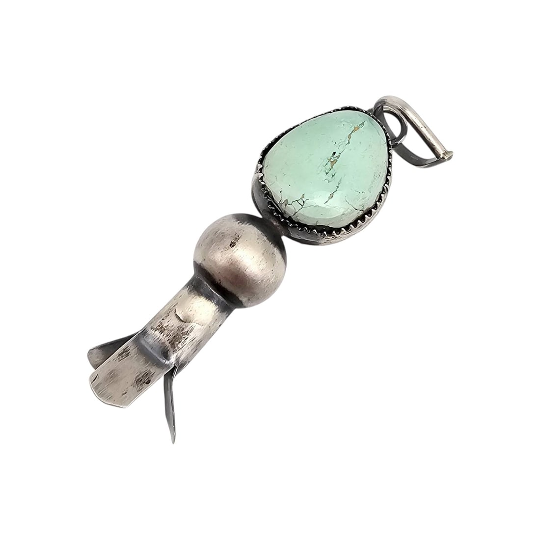 Navajo Sterling Royston Turquoise Pendant by Tia Long: Navajo handmade sterling silver pendant by Tia Long featuring a Royston turquoise stone. Marked ‘T13 Sterling’ on the back. The pendant showcases a floral or squash blossom design and weighs 7.9 g