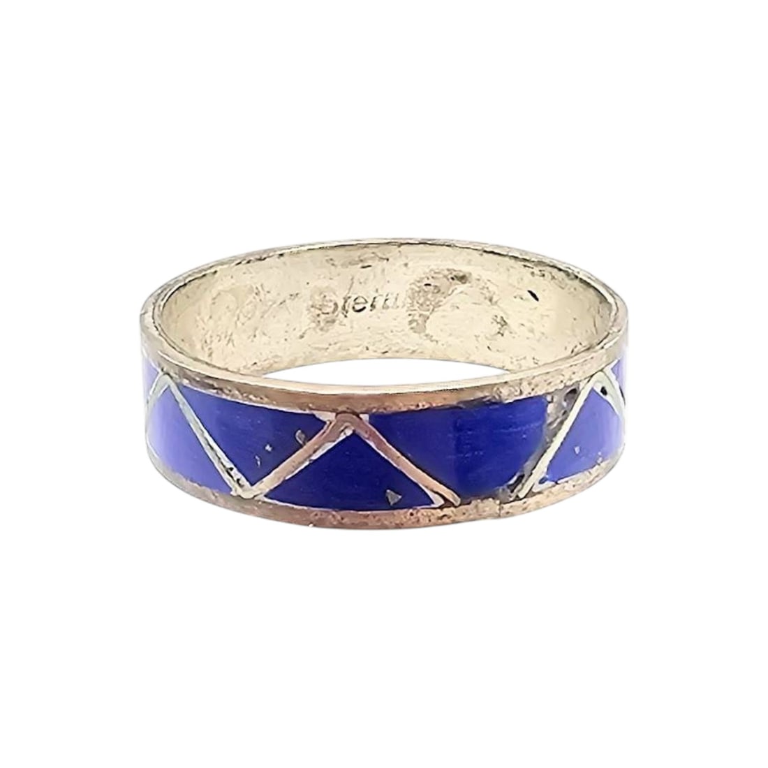 Roger Morgan Navajo Sterling Lapis Ring Sz 7: Sterling silver ring handmade by Roger Morgan, a Navajo artisan. The ring features lapis inlay in a geometric pattern. It is marked sterling, weighs approximately 1.3 grams, and has a size of 7. The c