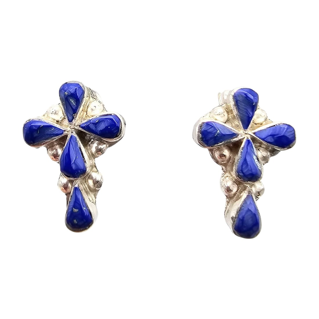 Pino Yunie Zuni Sterling Lapis Earrings: Zuni handmade sterling silver earrings by Pino Yunie. Each earring features a decorative design with lapis inlays. The total weight of the earrings is approximately 4.5 grams. Includes butterfly backs