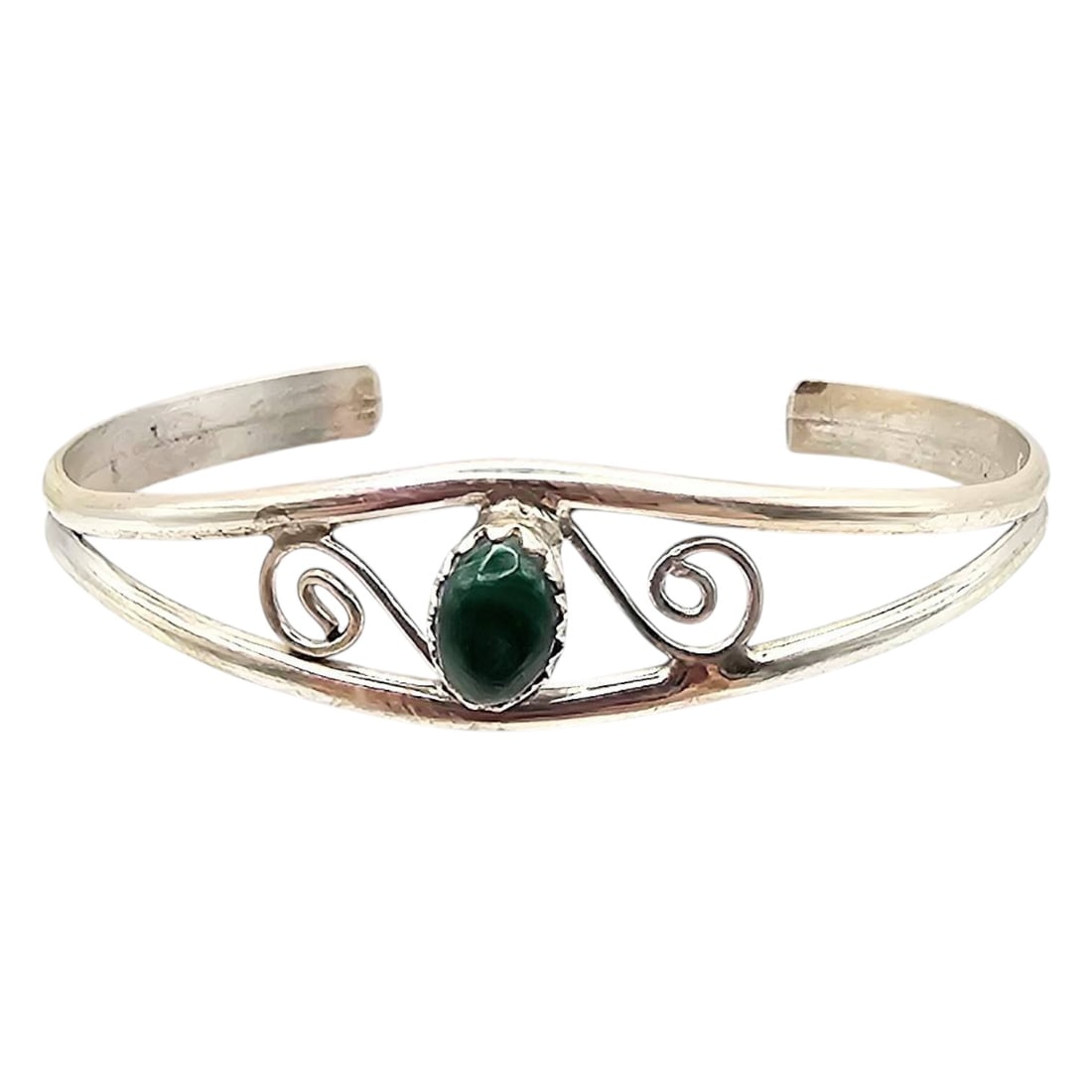 Grace Smith Navajo Sterling Malachite Baby Bracelet: Handmade Navajo baby bracelet by Grace Smith, crafted from sterling silver with an inset green malachite stone. The bracelet features elegant swirl designs and measures approximately 3 inches in diame