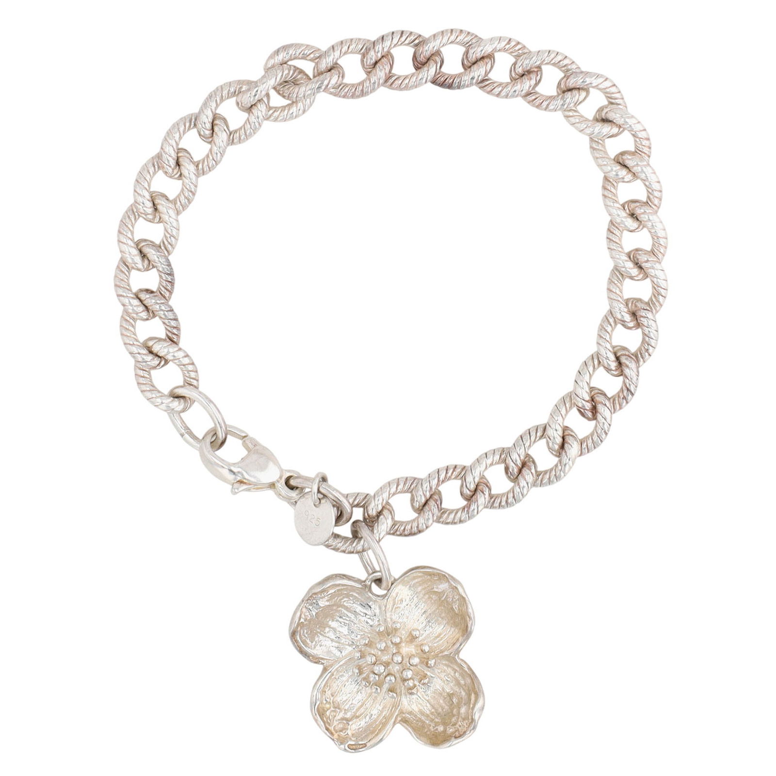 Tiffany & Co. Sterling Dogwood Bracelet: Vintage Tiffany & Co. Sterling Dogwood Bracelet, Retired | bracelet length approx 7.5" | dogwood approx .86" x .86" | 27.5g