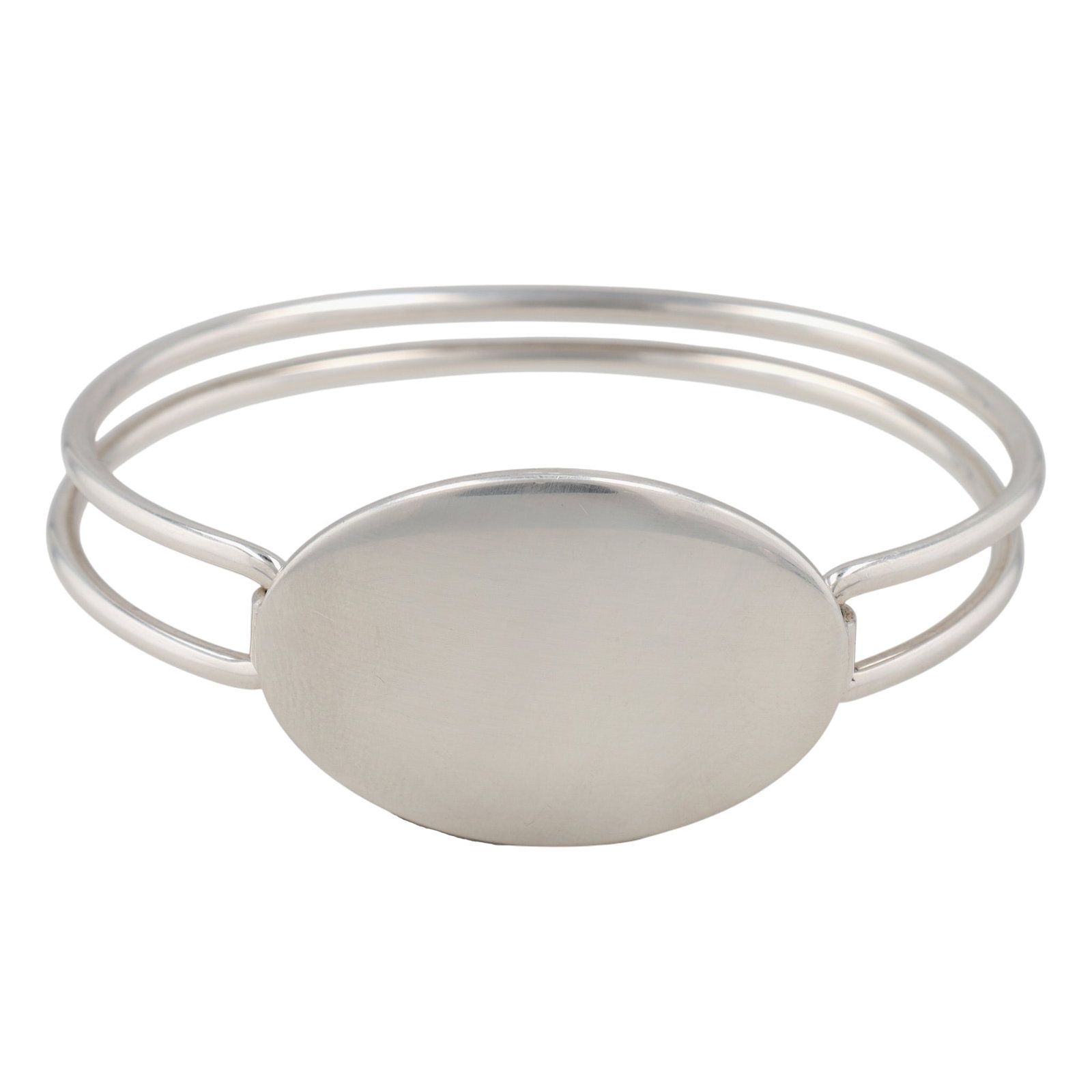 Tiffany & Co. Sterling Oval Tag Bangle Bracelet: Tiffany & Co. Sterling Oval Tag Bangle Bracelet | 32.9g | Comes with a Tiffany Box