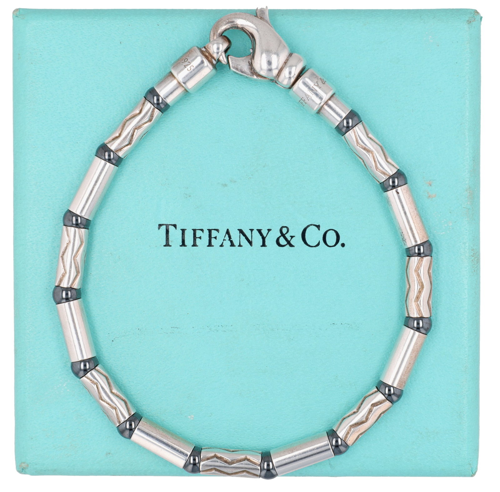 Tiffany & Co. Germany Sterling Hematite Aztec ZigZag Bracelet: Tiffany & Co. Germany Sterling Hematite Aztec ZigZag Bracelet | approx. 7.5" unclasped length | 24.2g | Comes with a Tiffany Box as shown